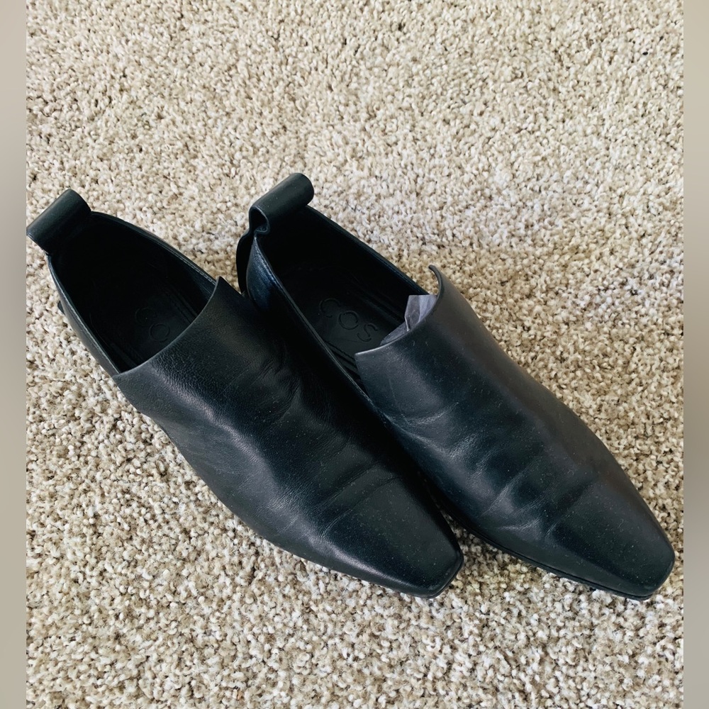 COS black leather loafers in size 37 Made in Portugal.